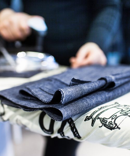 cropped-image-of-woman-ironing-fabric-in-jeans-fac-CCSTHE4a cropped-image-of-woman-ironing-fabric-in-jeans-fac-CCSTHE4a
